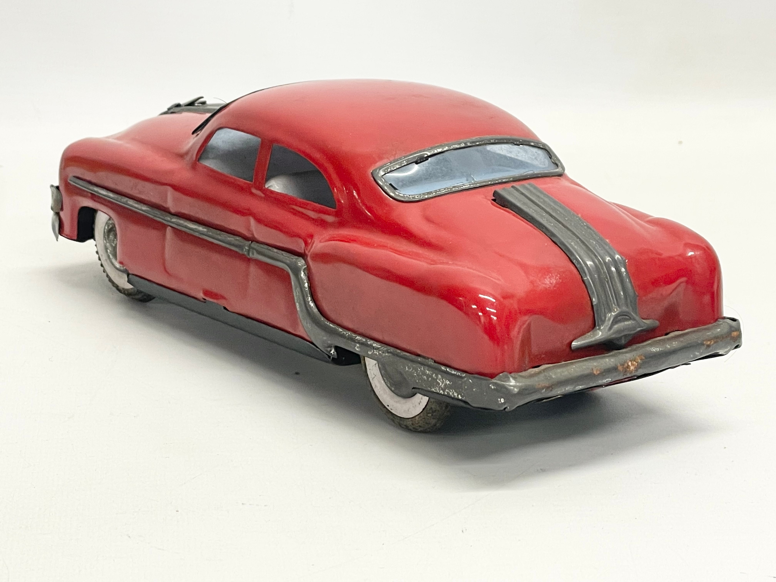A vintage tin plate Mechanical & Automatic ‘Minister Delux’ collectors Pontiac car in original - Image 4 of 6