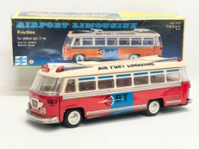 A vintage long tin plate friction ‘Airport Limousine’ MF 910 in original box. Shanghai. Bus measures