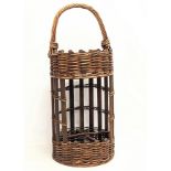 A vintage wicker bottle holder. 72cm