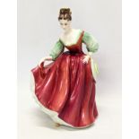 A Royal Doulton pottery figure, "Fair Lady (Red)." 18cm
