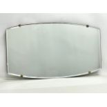 A 1930’s Art Deco bevelled mirror. 66x38cm