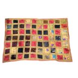 A vintage throw made from silk, linen and beadwork. 142x95cm