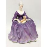 A Royal Doulton pottery figure 'Charlotte.' 16.5cm