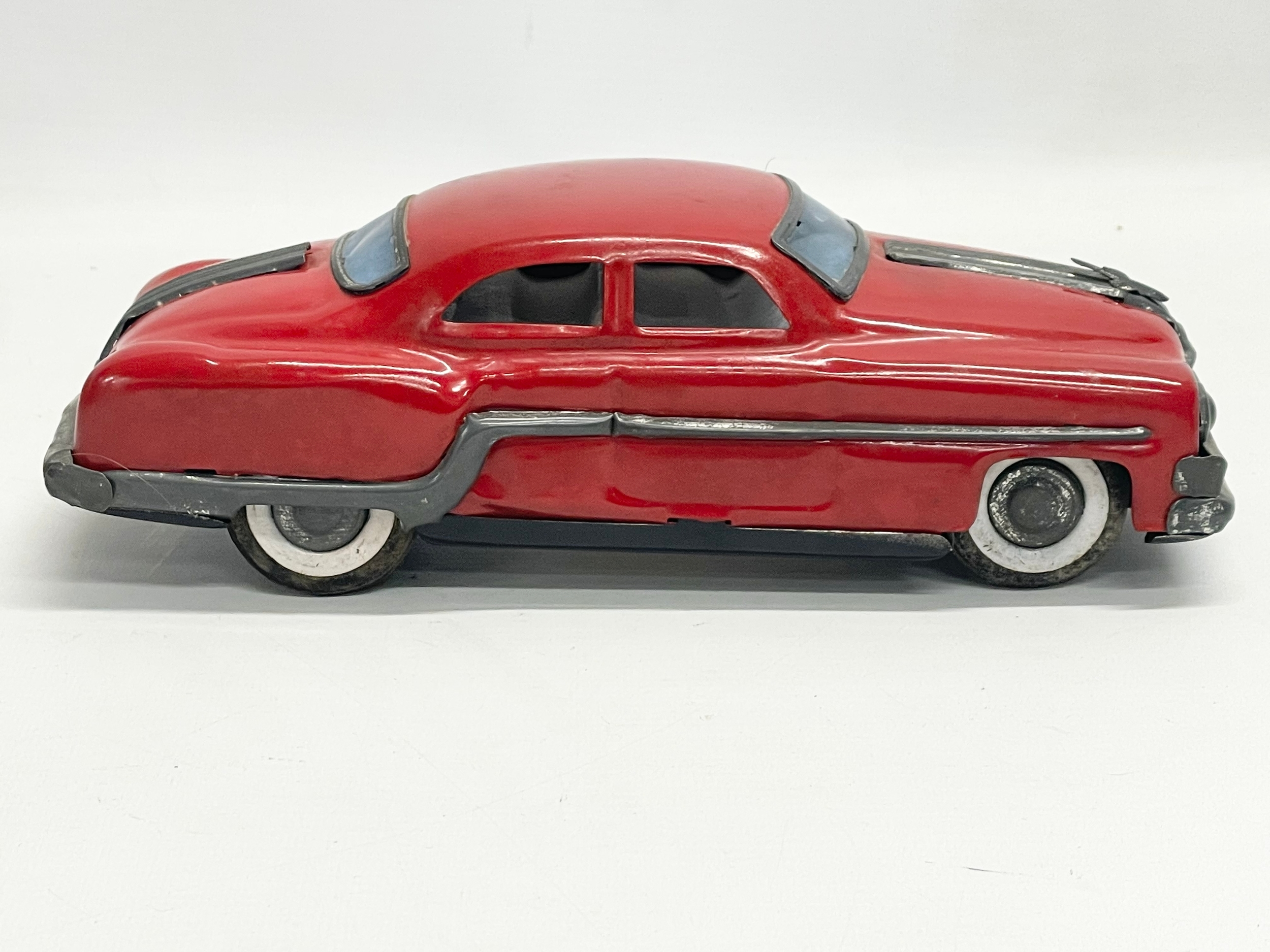 A vintage tin plate Mechanical & Automatic ‘Minister Delux’ collectors Pontiac car in original - Image 2 of 6