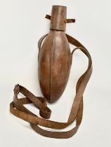A Victorian leather bound flask. 25cm.