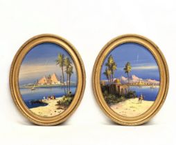 A pair of early 20th century oil paintings of Egyptian scenes in gilt frames. 49.5x59.5cm with