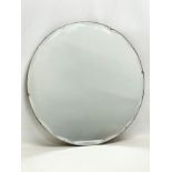 A 1930’s Art Deco bevelled mirror. 50.5cm
