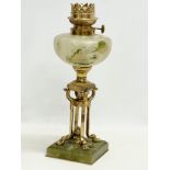A vintage ornate brass and onyx oil lamp. 38cm