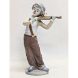A Lladro pottery figure, 'Bohemian Melodies.' From the Utopia Collection. 20cm