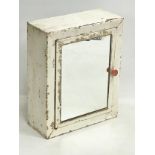 A 1950’s metal medicine cabinet. 29.5x12x36.5cm