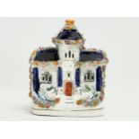 A 19th century Staffordshire pottery cottage. 13x16cm