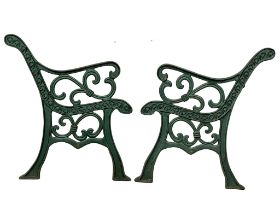 A pair of large cast iron garden bench ends. 72x77.5cm