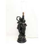 A large vintage heavy resin table lamp. 63cm