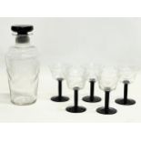 A vintage 6 piece etched glass drinks set. Decanter 21.5cm. Coupe sherry glass 7x10cm