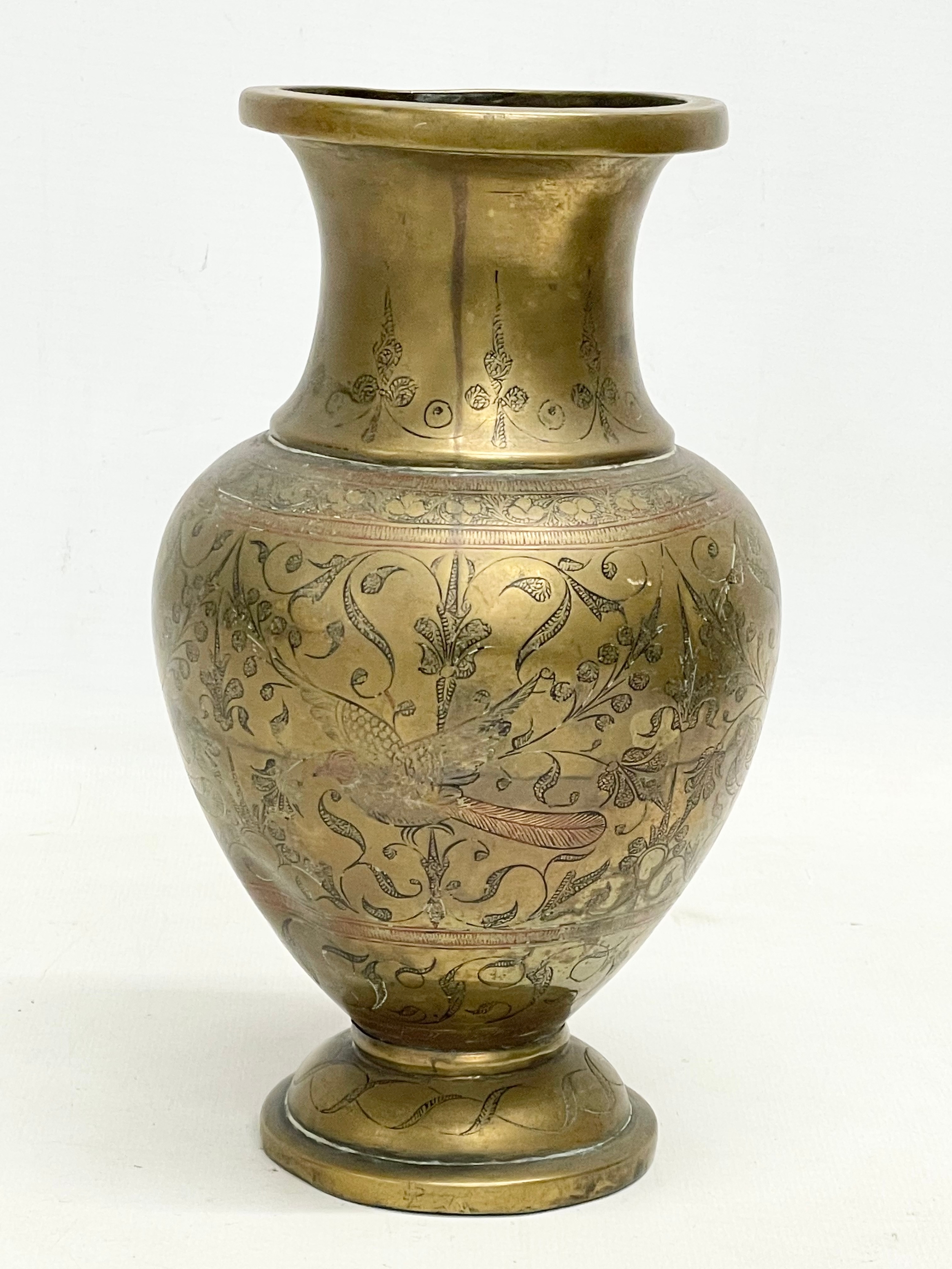 A large 19th century Middle Eastern brass bowl with a late 19th/early 20th century brass vase. - Image 6 of 13