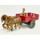 A 1940’s Marx vintage tin plate wind up horse and cart. 28cm
