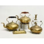 A collection of Victorian brassware. 3 Victorian rasa kettles, a trivet stand, candlestick etc.