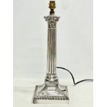 A large good quality early 20th century heavy silver plated table lamp. Retailed by Cahoon