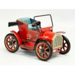 A vintage tinplate lever action toy car. Modern Toys, Japan. 14cm