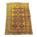 A vintage Middle Eastern hand knotted rug. 140x210cm