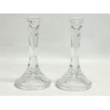 A pair of crystal candlesticks. 21.5cm