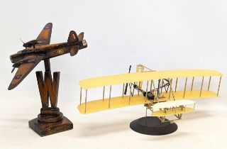 2 model airplanes, 1 motorized.