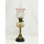 A large Victorian brass double burner oil lamp, with etched and Cranberry Glass shade. 73cm