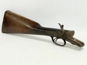 A 19th century musket. 49cm