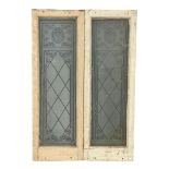 A pair of early 20th century etched glass panels. 38x110cm