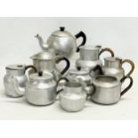 A collection of small vintage kettles and pots. Made by various companies.