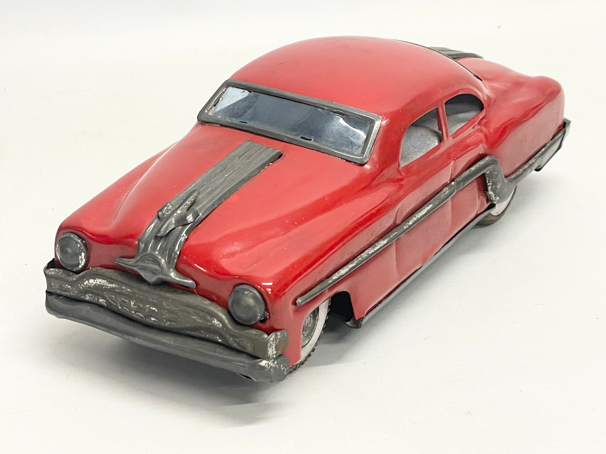 A vintage tin plate Mechanical & Automatic ‘Minister Delux’ collectors Pontiac car in original - Image 3 of 6