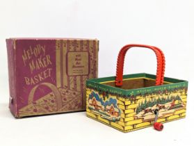 A vintage musical Christmas toy in box. Plays Jingle Bells. Box measures 15x13x7cm