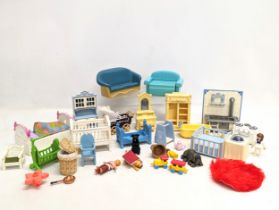 A quantity of vintage doll house furniture