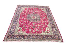 A very large Middle Eastern hand knotted rug, 414x308cm