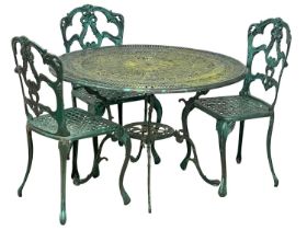 A vintage Victorian style cast alloy garden table with 3 chairs. 105x68cm