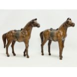 A pair of large good quality vintage leather horses. 36x33cm