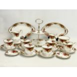A 26 piece Royal Albert Old Country Roses tea set. Cake stand, a pair of serving dishes, 6