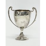 A small sterling silver cup. London. 40.57 grams. 7x8cm