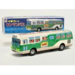 A long vintage tin plate Ichiko passenger bus in original box. Made in Japan. Bus measures 41cm