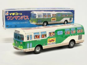 A long vintage tin plate Ichiko passenger bus in original box. Made in Japan. Bus measures 41cm