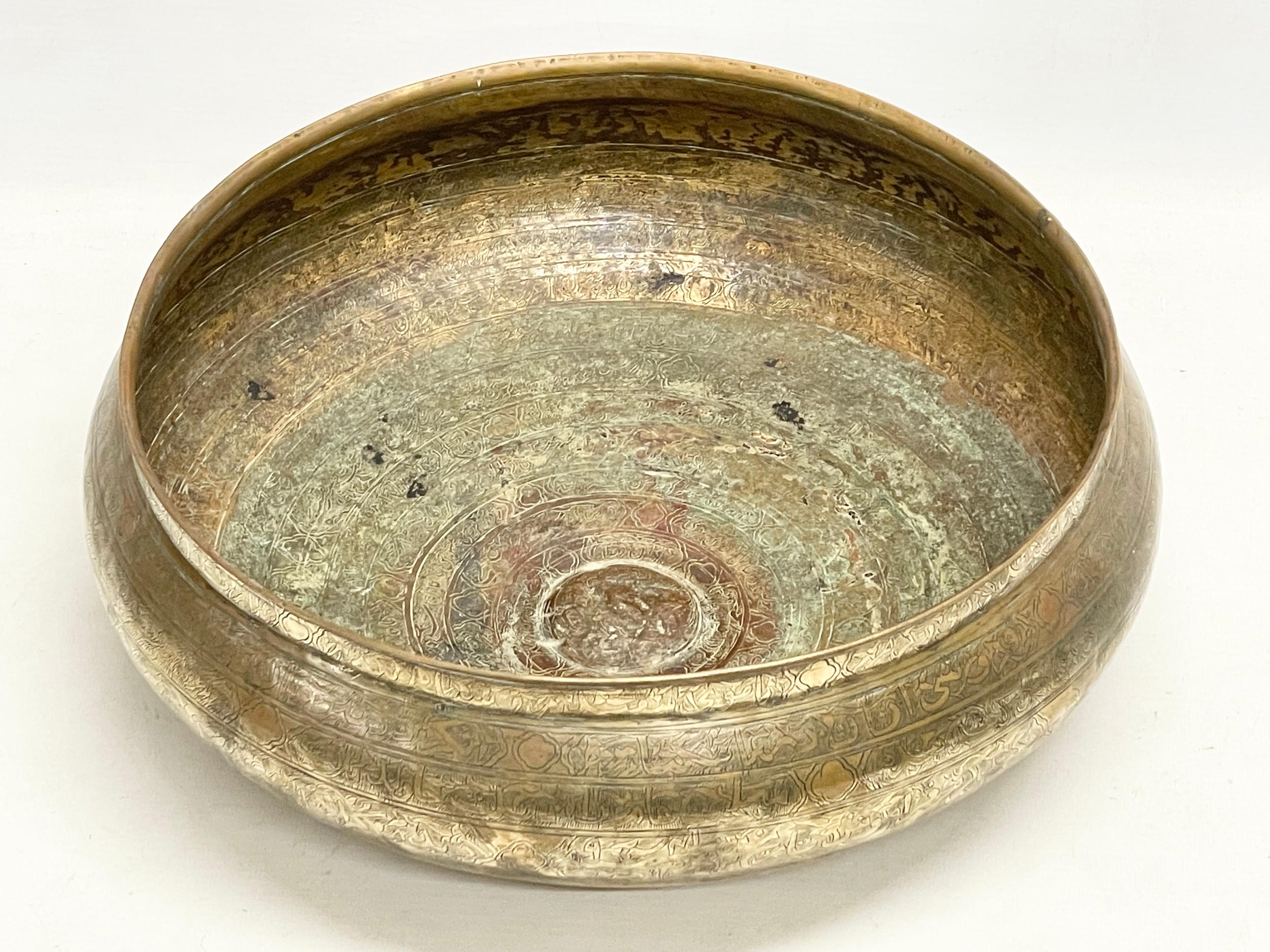 A large 19th century Middle Eastern brass bowl with a late 19th/early 20th century brass vase. - Image 2 of 13