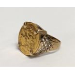 A 9ct gold ring with a Half Sovereign. 7.5g. Size UK R.