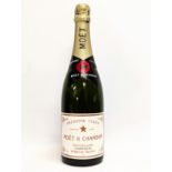 A vintage bottle of Moet & Chandon Champagne Epernay France Premiere Cuvee.