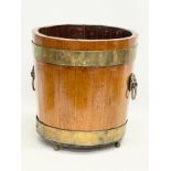 A late Victorian oak brass bound coal bucket. Circa 1900. 23x30cm