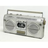A vintage Sharp stereo radio tape recorder. Model GF-6464E. 51cm