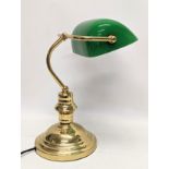 A brass desk lamp with glass shade. 36cm