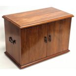 A walnut tabletop drinks cabinet. 61x34.5x42cm