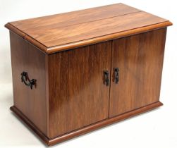 A walnut tabletop drinks cabinet. 61x34.5x42cm