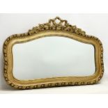 A good quality early 20th century ornate gilt framed mirror. 87.5x57.5cm.