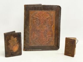 3 vintage embossed leather cases. A Gaelic leather folder 18x22.5cm. A leather card case and a